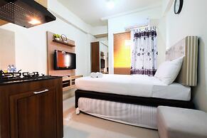 Studio Room at Green Pramuka City Apartment with Mall Access By Travel
