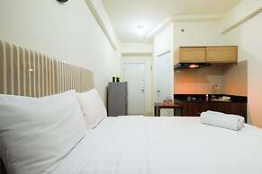 Studio Room at Green Pramuka City Apartment with Mall Access By Travel