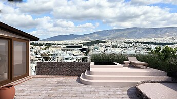 Karyatis Luxury Maisonette by K&K