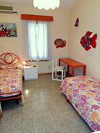 Lignano Riviera con 3 camere e giardino