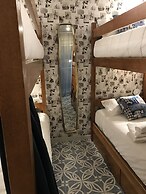 Royal Beach Hostel & Suites