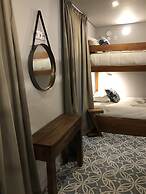 Royal Beach Hostel & Suites