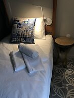 Royal Beach Hostel & Suites