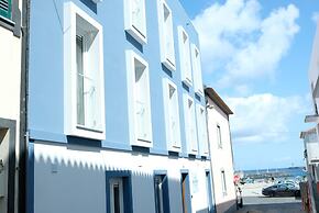 Royal Beach Hostel & Suites