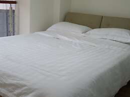 Yunzu Aparthotel - Huanlegu Branch