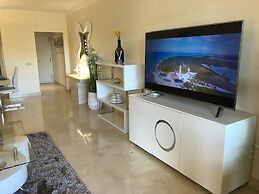 Casares Beach Golf Apartment With Private Garden and Pool Access