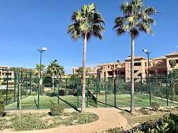 Casares Beach Golf Apartment With Private Garden and Pool Access