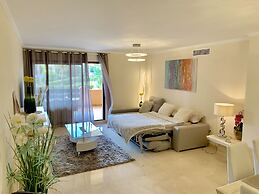 Casares Beach Golf Apartment With Private Garden and Pool Access