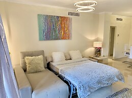 Casares Beach Golf Apartment With Private Garden and Pool Access