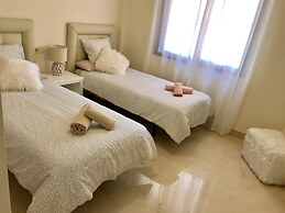 Casares Beach Golf Apartment With Private Garden and Pool Access