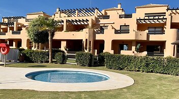 Casares Beach Golf Apartment With Private Garden and Pool Access
