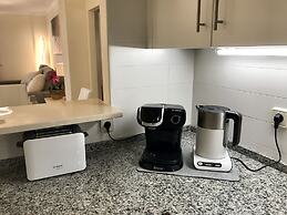 Casares Beach Golf Apartment With Private Garden and Pool Access