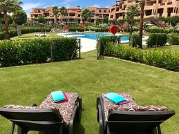 Casares Beach Golf Apartment With Private Garden and Pool Access