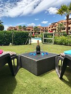 Casares Beach Golf Apartment With Private Garden and Pool Access