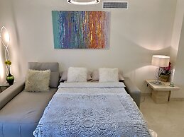 Casares Beach Golf Apartment With Private Garden and Pool Access