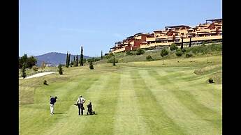 Casares Beach Golf Apartment With Private Garden and Pool Access