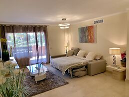 Casares Beach Golf Apartment With Private Garden and Pool Access