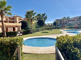 Casares Beach Golf Apartment With Private Garden and Pool Access