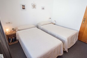 Beach House with Balcony and beach view