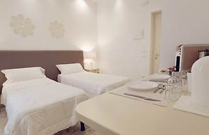 FLOS Guest House