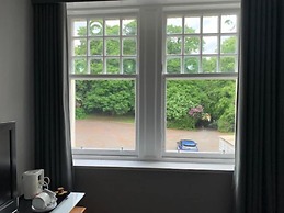 OYO Dunmar House Hotel