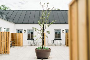 Mälarhusen Semesterby Österlen - Stugor & Gårdssviter