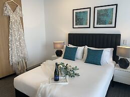 Essence Suites Taringa