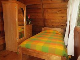 Cabañas Armonía y Jardín de Orquideas