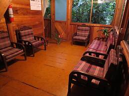 Cabañas Armonía y Jardín de Orquideas