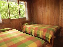 Cabañas Armonía y Jardín de Orquideas