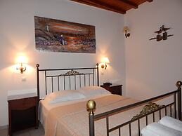 Tinos Suites & Apartments