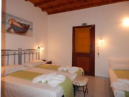 Tinos Suites & Apartments