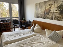 Berghotel Hahnenklee mit Ferienhaus