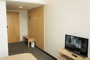 Zaliasis slenis - Self check-in hotel