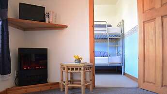 Snowgoose Apartments & Blacksmith Bunkhouse