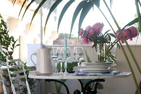 The Marble Suites, PLAKA