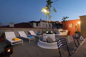 The Marble Suites, PLAKA
