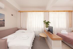 The Marble Suites, PLAKA