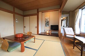 Yakiniku to Kaisen no Yado Raku