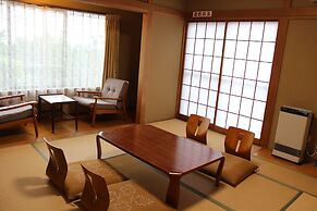 Yakiniku to Kaisen no Yado Raku