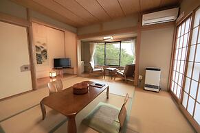 Yakiniku to Kaisen no Yado Raku