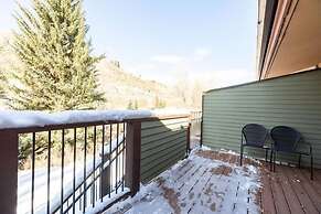 Townhome with Covered Parking Space & Fireplace by RedAwning
