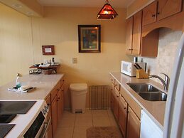 High Ceiling Skyleaf A9 Condo with Fireplace by RedAwning