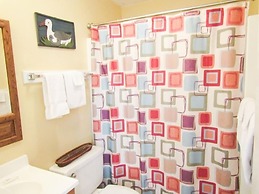 High Ceiling Skyleaf A9 Condo with Fireplace by RedAwning