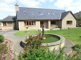 The Hollies on the Wall