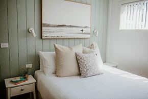 Surfside Cudmirrah Beach