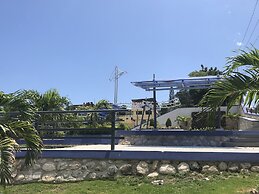 Detente Du Cacique Villa Hotel