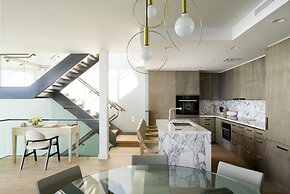 Real Select at the Ritz Carlton Residences, Waikiki Beach