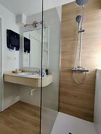 Apartamentos El Paseo