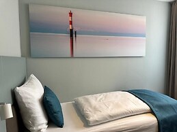Hotel Schöne Aussicht, Stilvoll modern, direkt am Rüstersieler Hafen